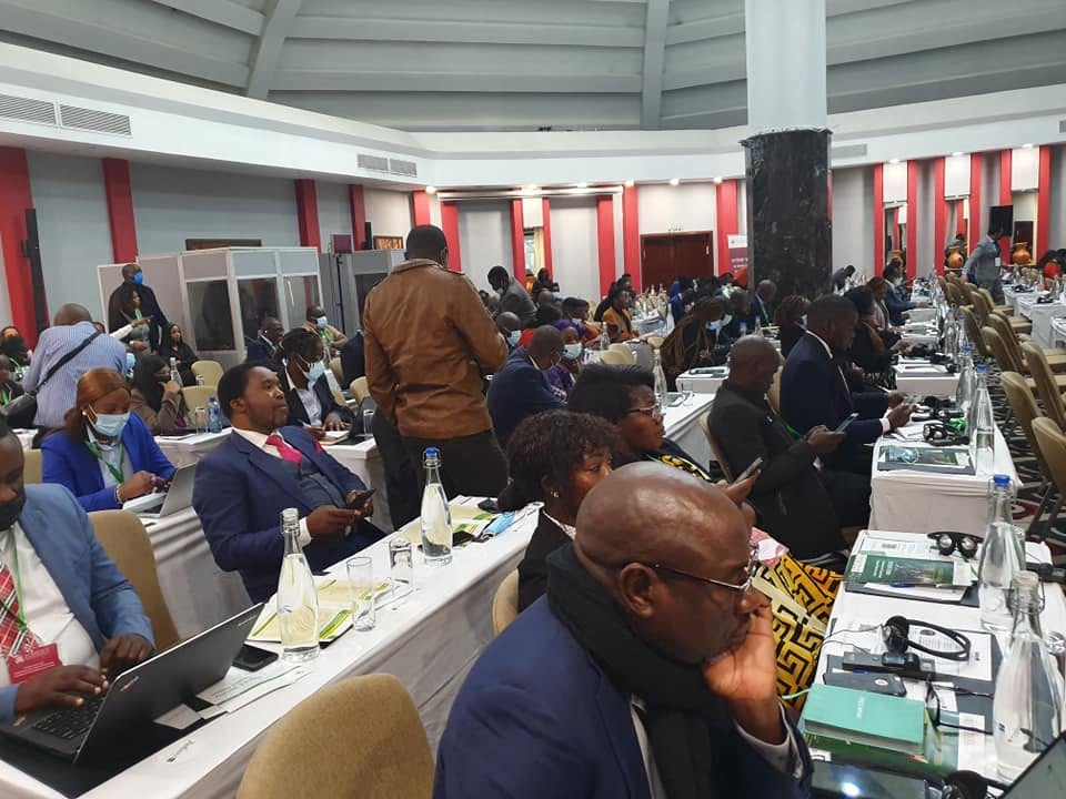 Delegates in a large conference hall during a regional East African forum on domestic resource mobilisation.